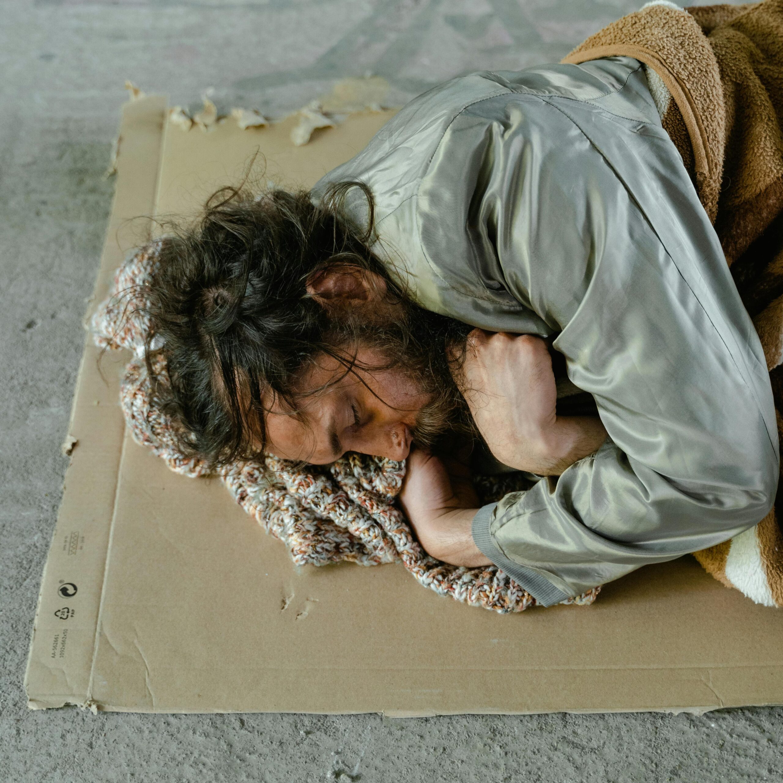 Na zdjęciu osoba bezdomna